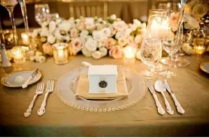 Gold and cream table setting.