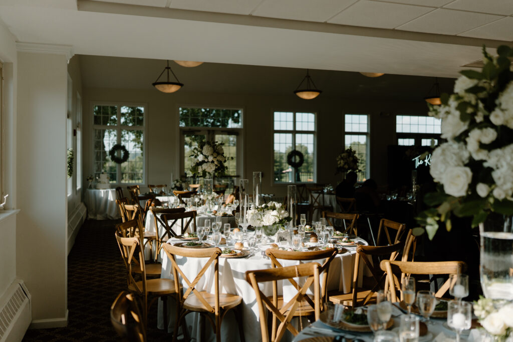 Tables and chairs set up in the ballroom of Flourtown Country Club